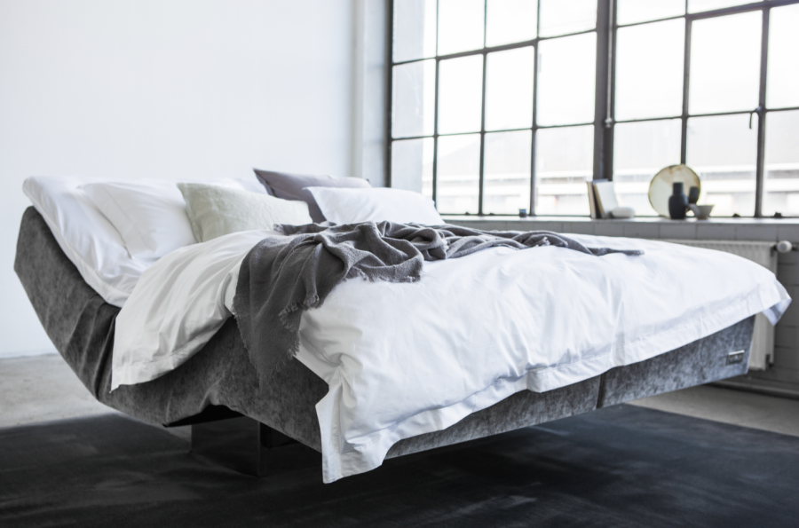 polohovací masážní postel