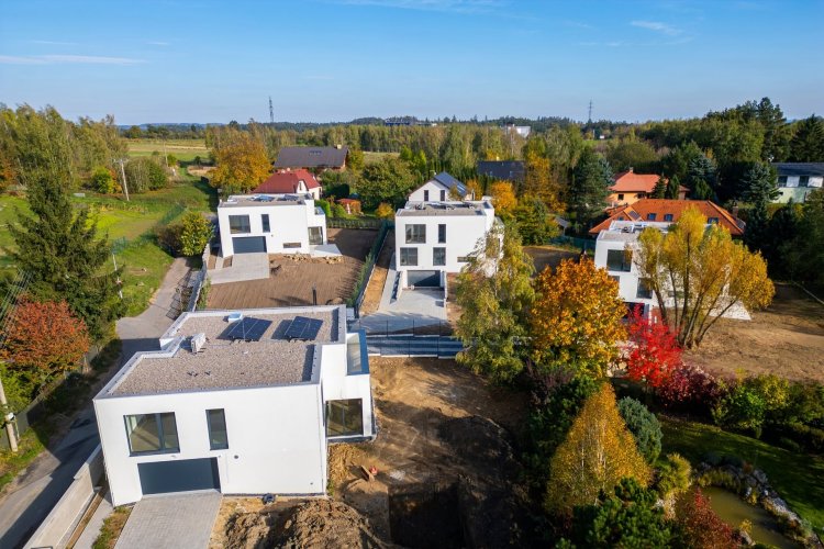 New project of four modern family houses Malostanská - Velké Popovice